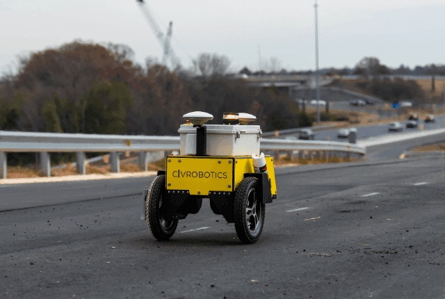 CivDot Mini robot performing fast layout for road marking